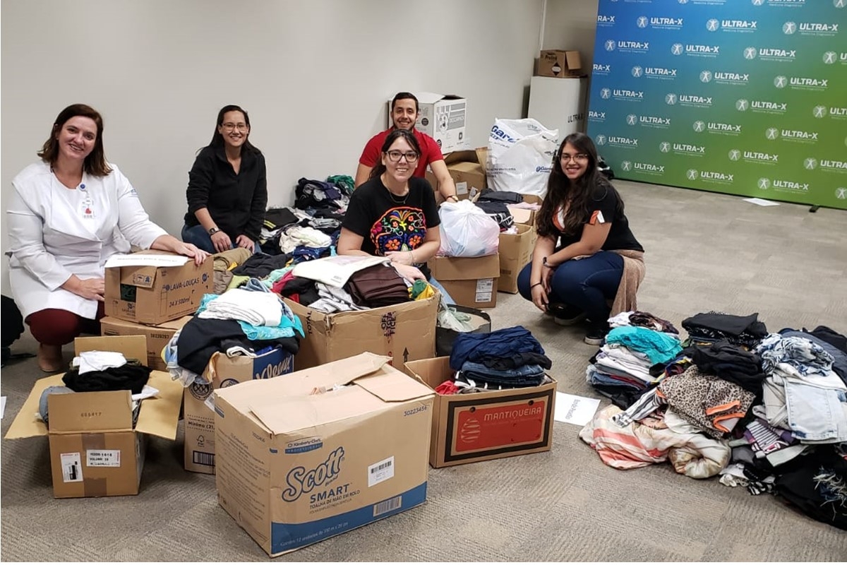 Ultra-X doa roupas e agasalhos para a Casa do Cireneu